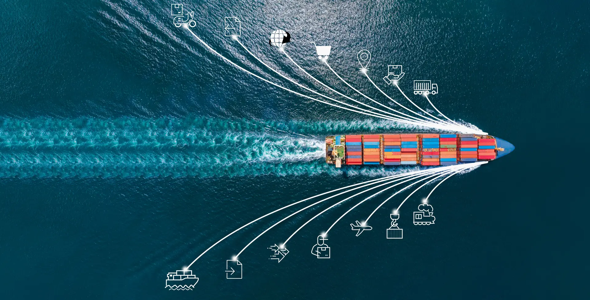 Aerial view of a container ship moving freight across the ocean